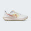 Side Profile Image: The Iris Whisper Pegasus 39, highlighting the Madder Root Swoosh and the streamlined Nike React midsole.