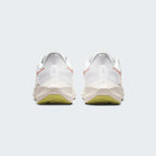 View from Behind Looking at the Heel: Focusing on the landing-optimised heel shape and the Atmosphere pink accents.