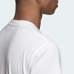 Close-up zoom on the Adidas Trefoil T-Shirt Men's in white, showing the soft cotton jersey fabric texture from the rear