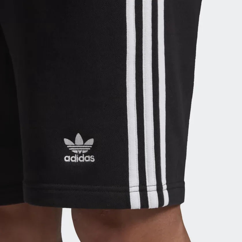 Close-up of adidas 3-Stripes Men's Sweat Shorts DH5798 soft fleece material with stitching detail