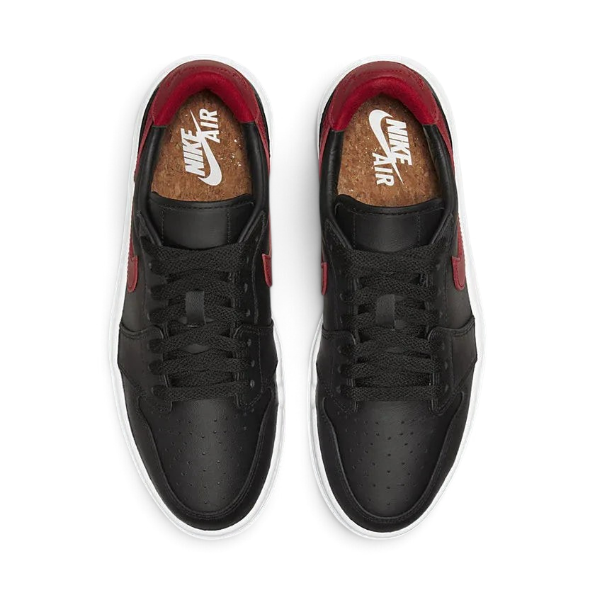 Alt Text: Top-down view of a pair of Air Jordan 1 Elevate Low Women's trainers in black, red, and white, highlighting their classic silhouette and platform sole.