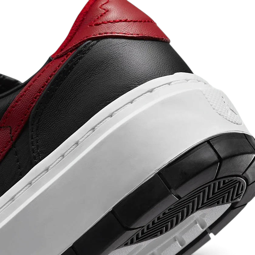 Detailed zoom on the midsole of the Air Jordan 1 Elevate Low Women's trainers, highlighting the elevated platform and classic branding.