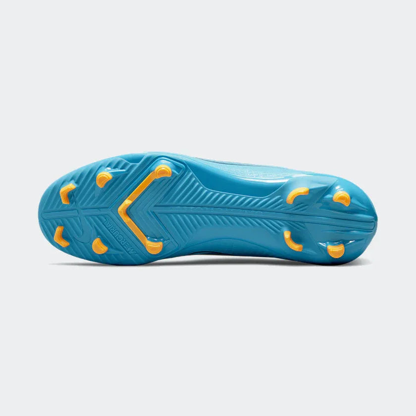 Close-up of the Nike Vapor 14 Club FG/MG men's football boot's multi-directional stud pattern on the outsole, ideal for firm ground.
