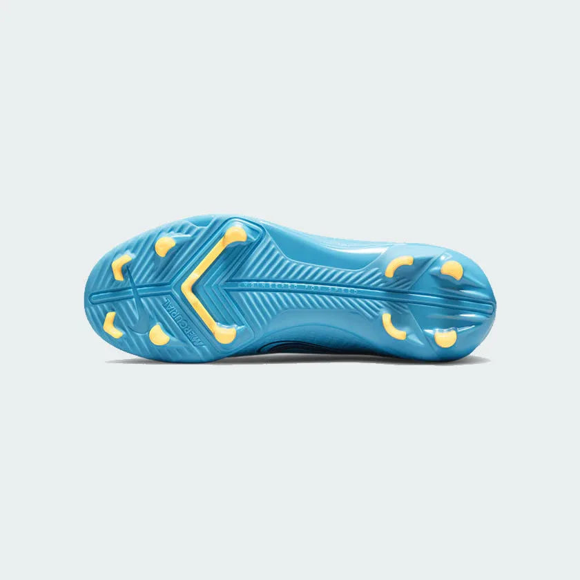Close-up of the Nike Vapor 14 Club FG/MG juniors' football boot's multi-directional stud pattern on the outsole, suitable for firm ground.