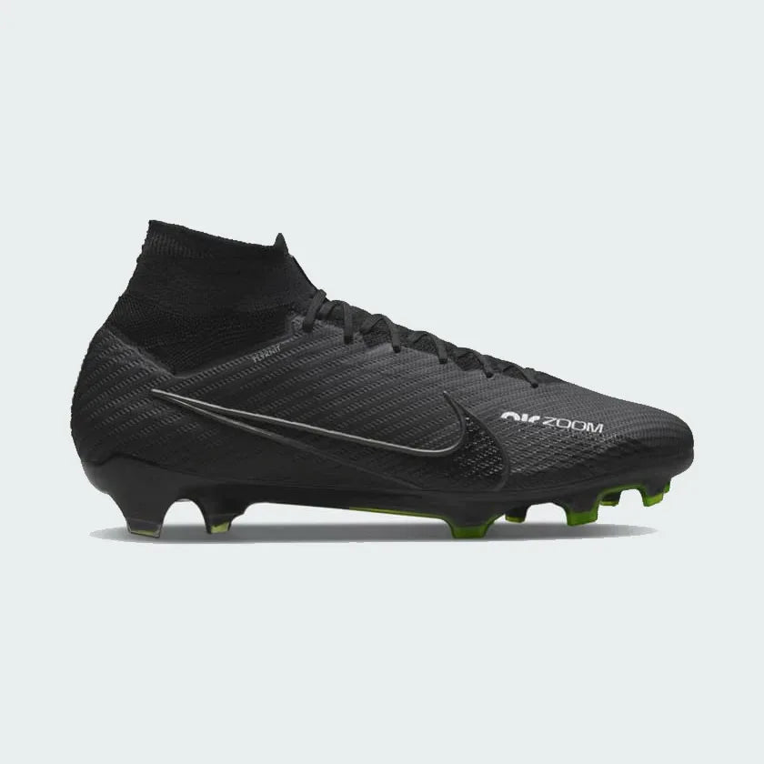 Nike Zoom Superfly 9 Elite FG men's football boot in black with volt and white accents, side profile showing Flyknit collar and signature Nike swoosh. Main image