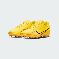 Nike Mercurial Vapor 15 Club Juniors Boots DJ5958-780 angled view highlighting lightweight silhouette and toe shape
