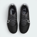 Focuses on the locked-in lacing layout, displaying the exact integration of the Flywire cables along the sides and the streamlined, skin-protected engineered mesh toe box area.