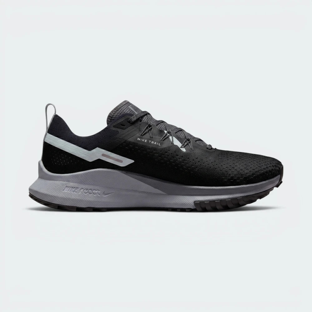 Highlights the high-velocity sweep of the Wolf Grey Nike Swoosh, showing the technical, dual-tone texture of the Black and Dark Grey mesh upper resting above the thick, angular React foam midsole wall.
