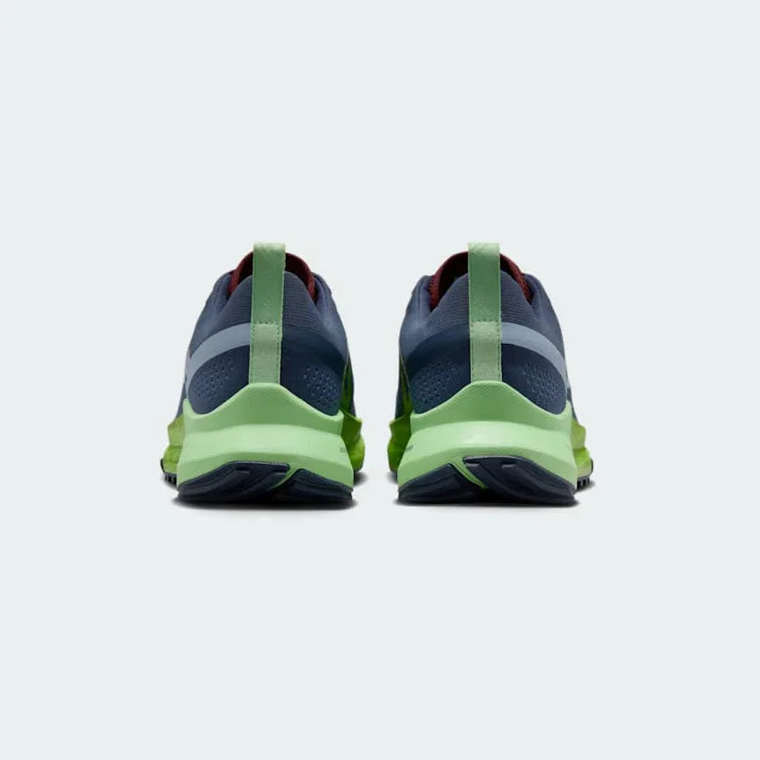 Rear view of the Nike React Pegasus Trail 4 Men's blue running shoes, focusing on the structured heel and reflective details.