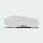 Nike Tanjun Men's Trainers DJ6258 outsole with textured grip pattern in solid black