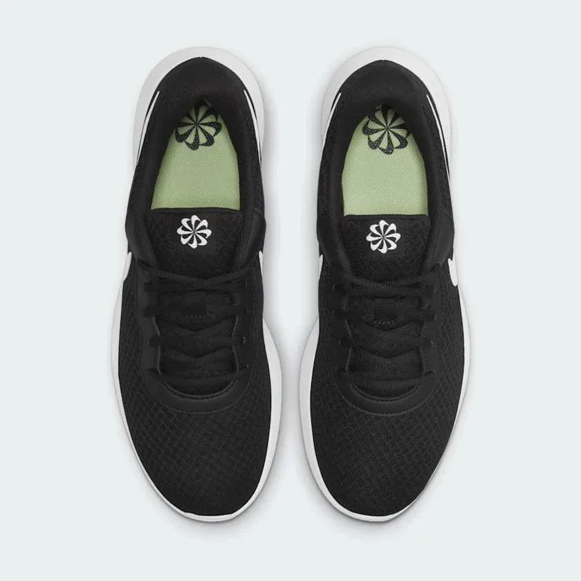 Nike Tanjun Men's Black Trainers DJ6258 angled side view showing low-cut profile and foam midsole
