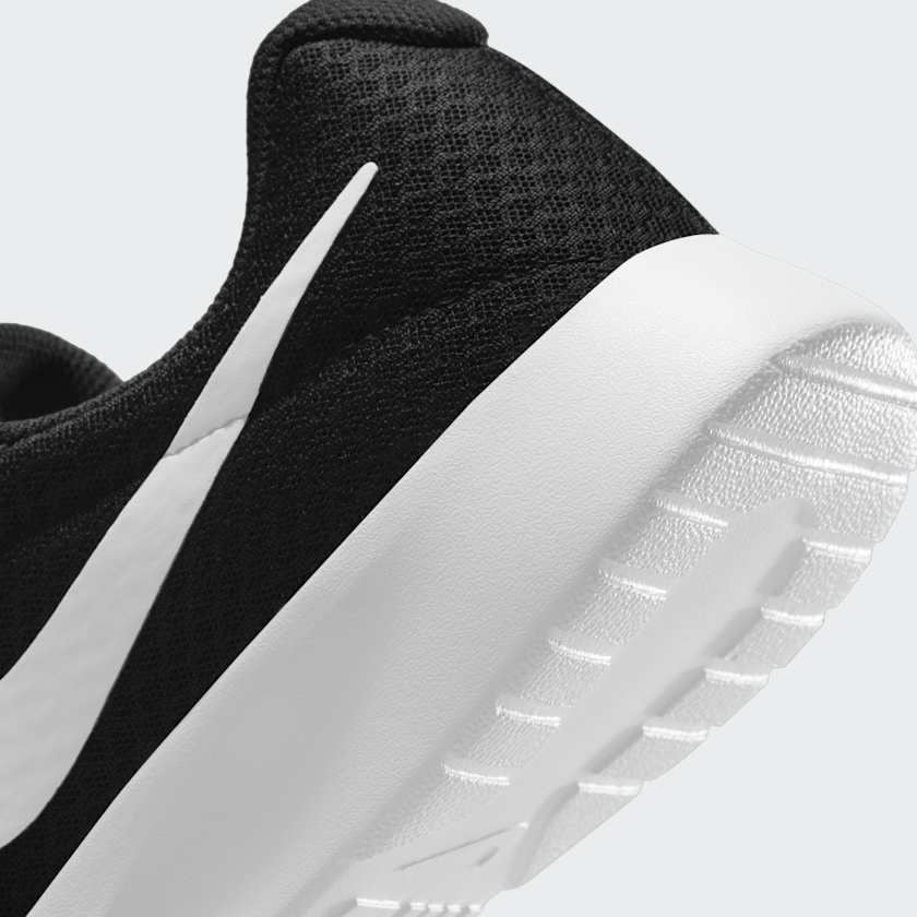 Rear underside close-up of Nike Tanjun Men's Trainers DJ6258 heel and outsole detail