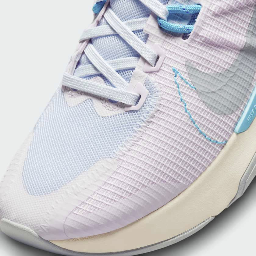 Close-up of Nike Juniper Trail 2 Women's Running Shoes DM0821-600 mesh texture, laces, and eyelets