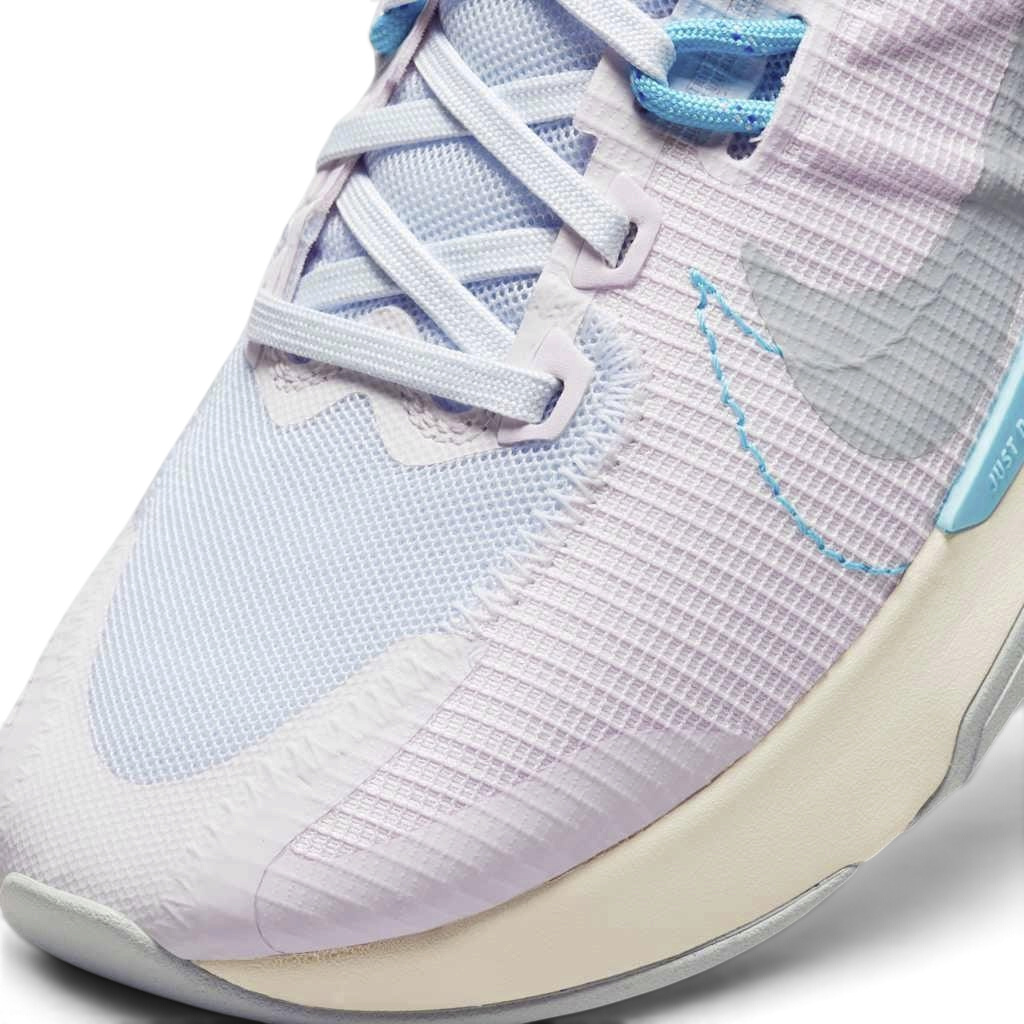Close-up of Nike Juniper Trail 2 Women's Running Shoes DM0821-600 mesh texture, laces, and eyelets