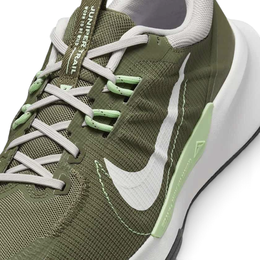 Close-up of Nike Juniper Trail 2 Next Nature Men's Trainers DM0822-200 showing breathable mesh texture, laces, and tongue logo