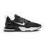 Nike Air Max Alpha Trainer 5 Men's shoes in black with white accents, side profile showing visible Max Air unit in the heel, durable mesh upper, and supportive overlays.