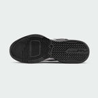 View of the outsole of the Nike Air Max Alpha Trainer 5 Men's black, showing the durable rubber tread pattern for multi-directional gym traction.