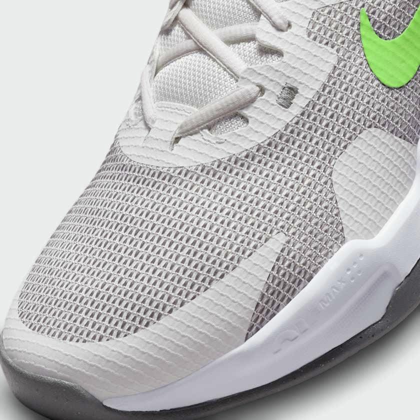 Close-up of Nike Air Max Alpha Trainer 5 Men's Shoes DM0829-009 laces, tongue logo, and mesh texture