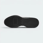 Displays the flat, wide sole and its enhanced rubber tread pattern engineered for unreal multi-surface traction on rubber gym mats.
