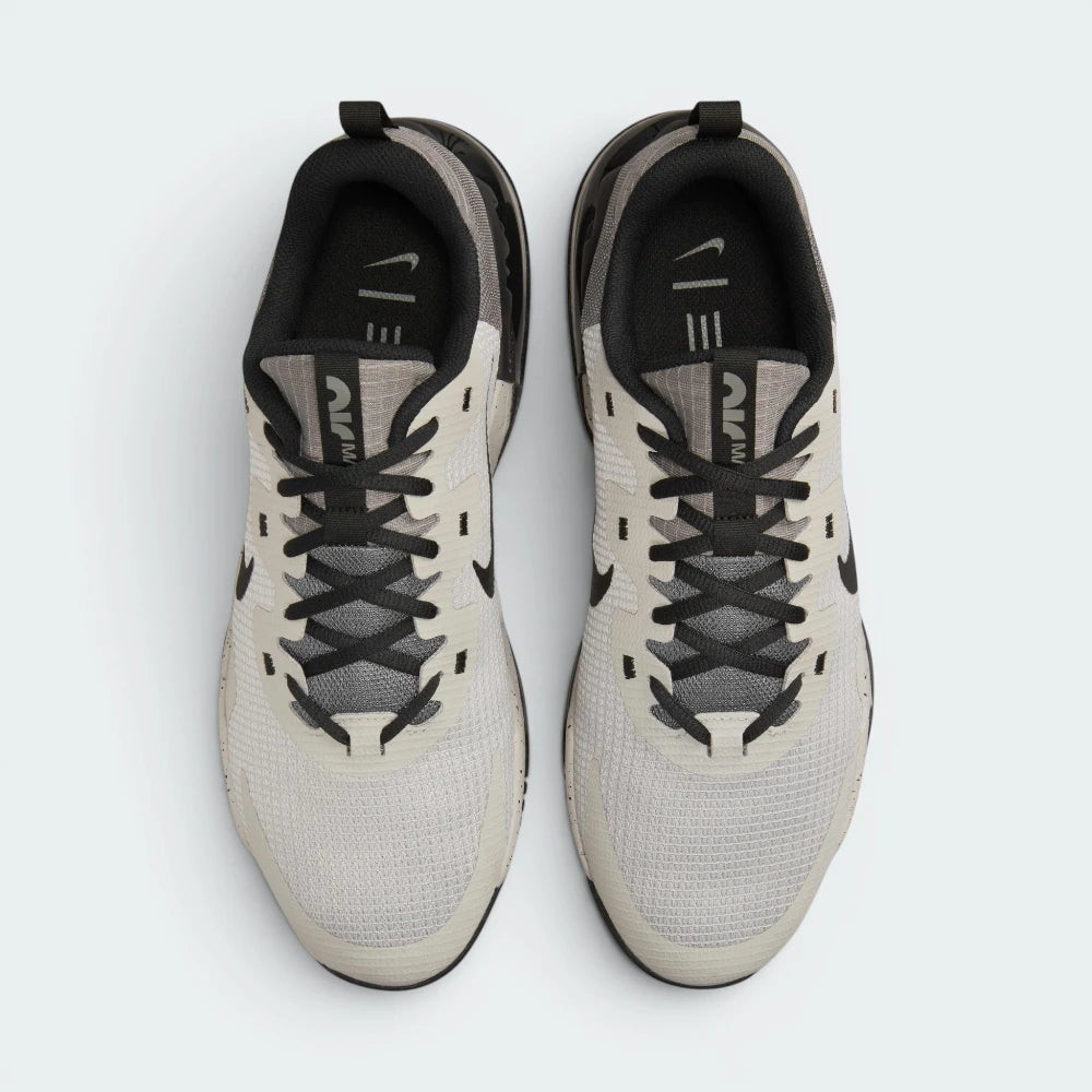 Focuses on the locked-in lace closure layout, the technical weave of the Flat Pewter mesh, and the breathable texturing over the tongue.
