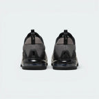 Focuses on the heavy-duty heel structure surrounding the Max Air window and the clean finish of the rear pull tabs.
