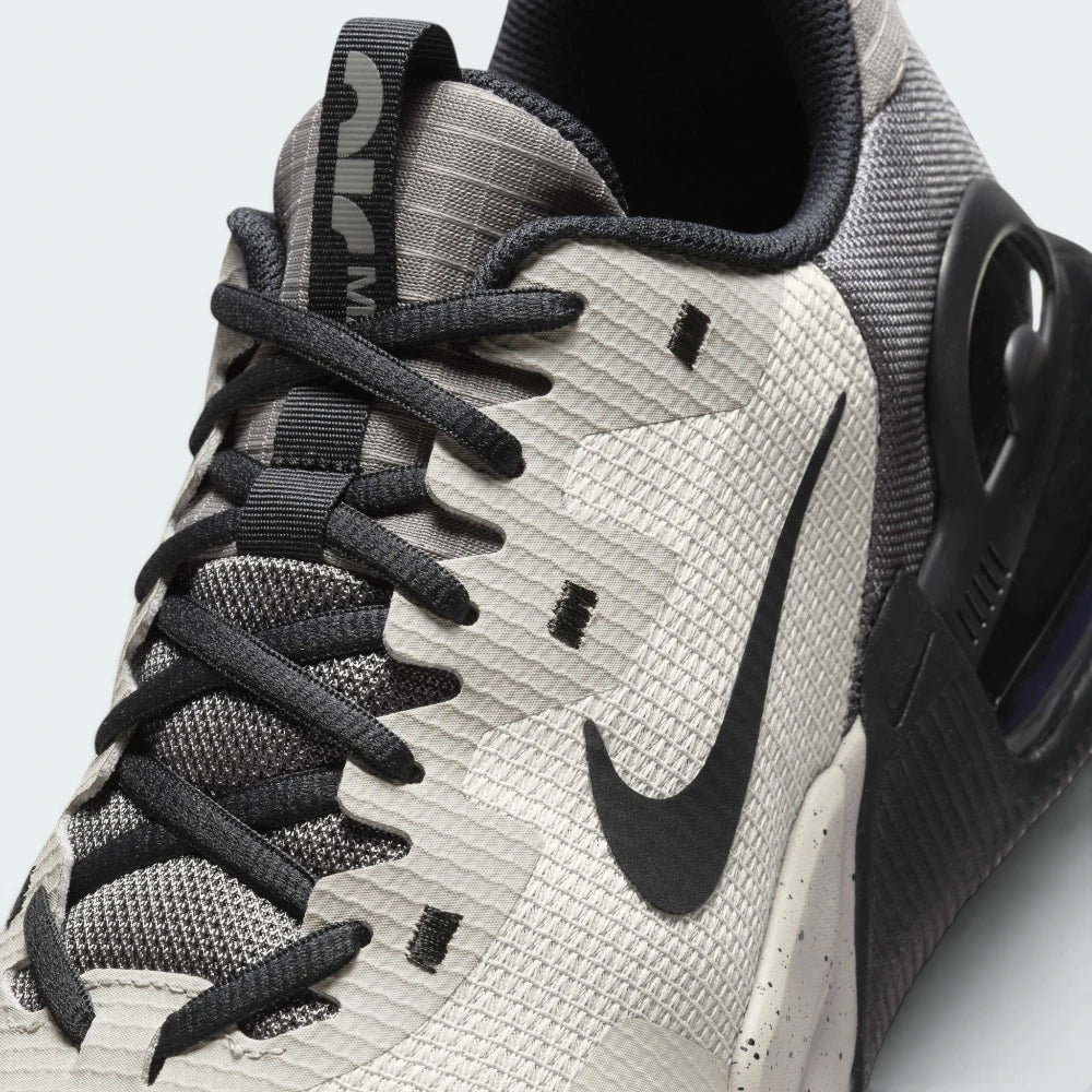 Details the high-definition durability overlays shielding the toe box and the precision of the lace eyelet stitching.