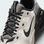 Details the high-definition durability overlays shielding the toe box and the precision of the lace eyelet stitching.