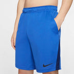 Close-up zoom on the fabric of the Nike Men's Dri-FIT 8" running shorts in obsidian, showing the lightweight, moisture-wicking texture and the embroidered white Nike Swoosh.