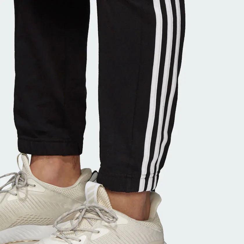 tradesports.co.ukAdidas Men's Fleece Jersey Comm Track Pants DM2127