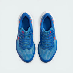 Top-down view of the junior trainers, highlighting the breathable mesh upper and the Bright Crimson lacing accents.