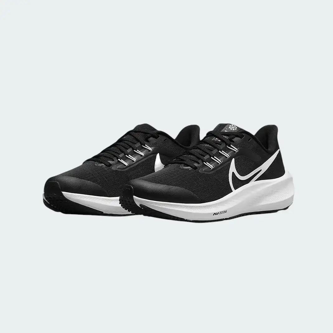 Angled view of two Nike Air Zoom Pegasus 39 Next Nature black and white trainers, side by side, showcasing their responsive design and athletic profile.