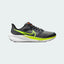 Nike Air Max Alpha Trainer 5 Men's shoes in black with white accents, side profile showing visible Max Air unit in the heel, durable mesh upper, and supportive overlays.