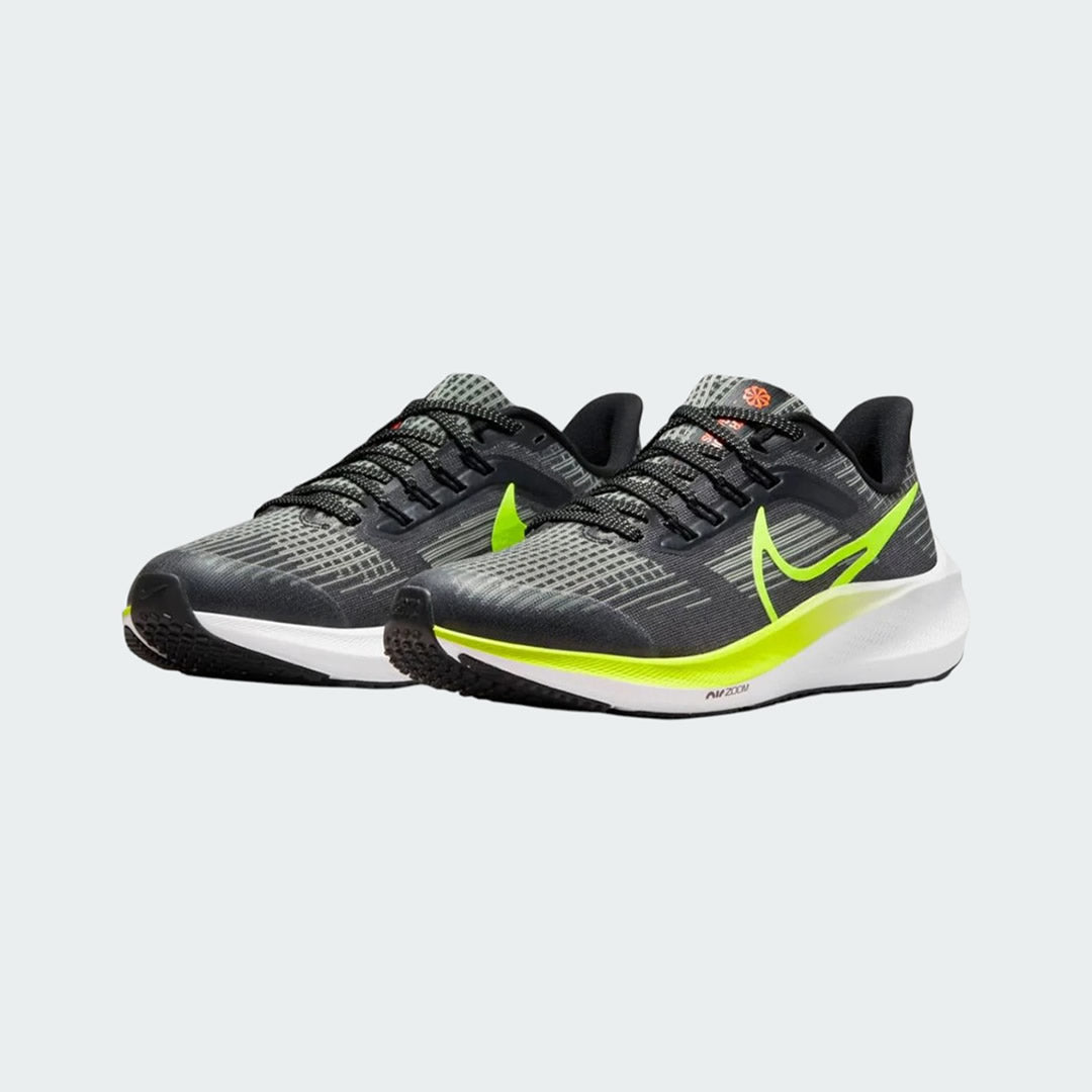 Angled view of two Nike Air Max Alpha Trainer 5 Men's black and white shoes, side by side, showcasing their robust design and stable platform.