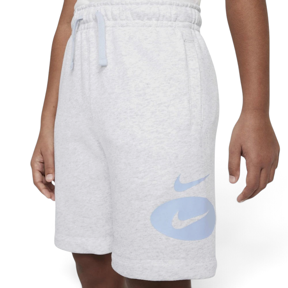 Focuses on the front-and-back styling of the casual cut silhouette, emphasizing the vibrant double Swoosh branding execution on the front leg panel against the clean, unbranded backing.