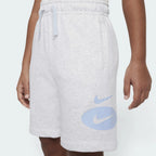 Focuses on the front-and-back styling of the casual cut silhouette, emphasizing the vibrant double Swoosh branding execution on the front leg panel against the clean, unbranded backing.