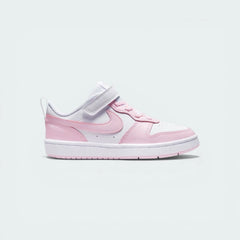 Side profile of the White and Pink Foam Nike Court Borough Low 2 Infants, highlighting the low-top silhouette and the soft pink Swoosh.