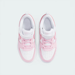 Top-down view of the infant trainers, showcasing the perforated toe box and the secure pink hook-and-loop strap.