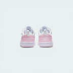 Rear view of the trainers, focusing on the "NIKE" branding at the heel and the comfortable padded collar.
