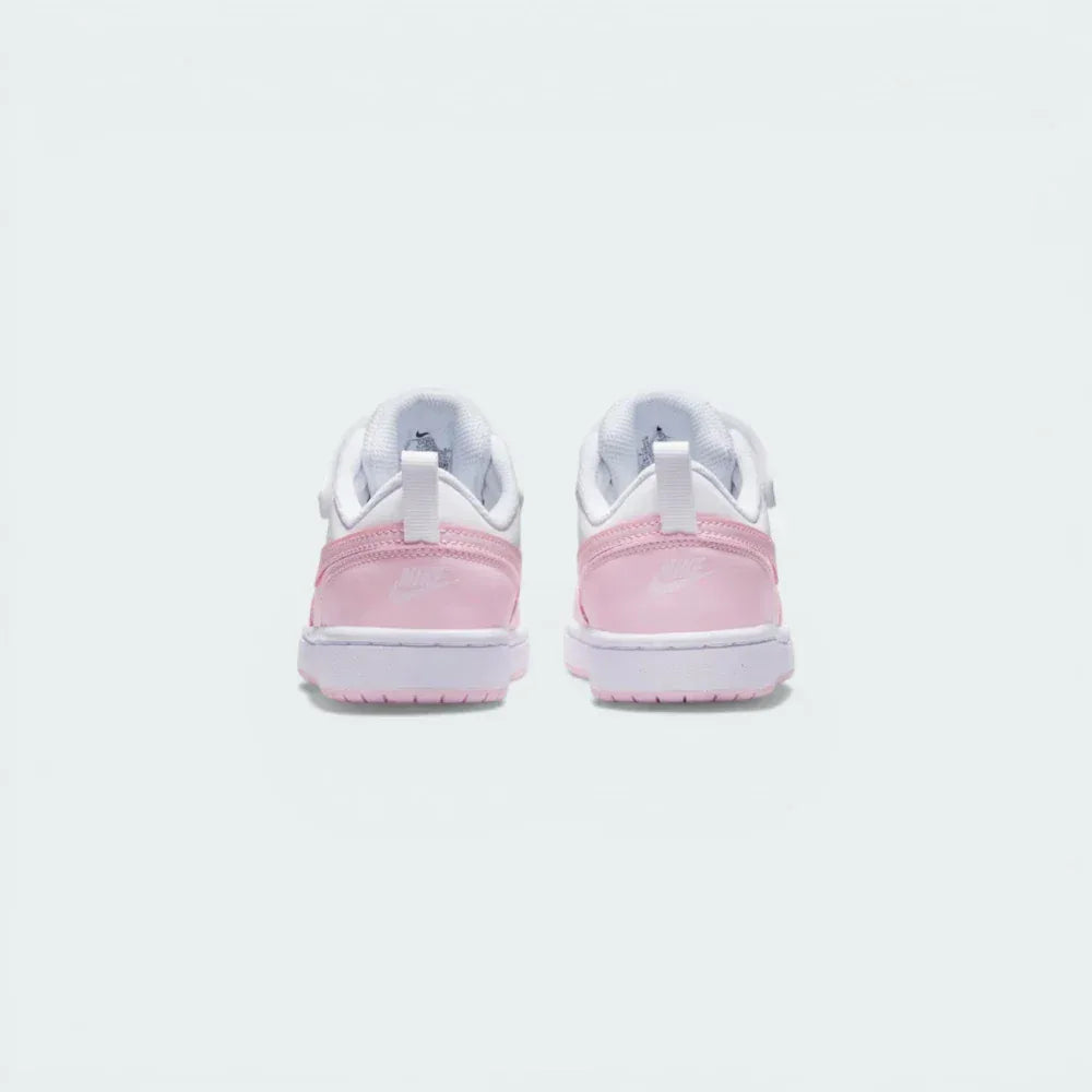 Rear view of the trainers, focusing on the "NIKE" branding at the heel and the comfortable padded collar.