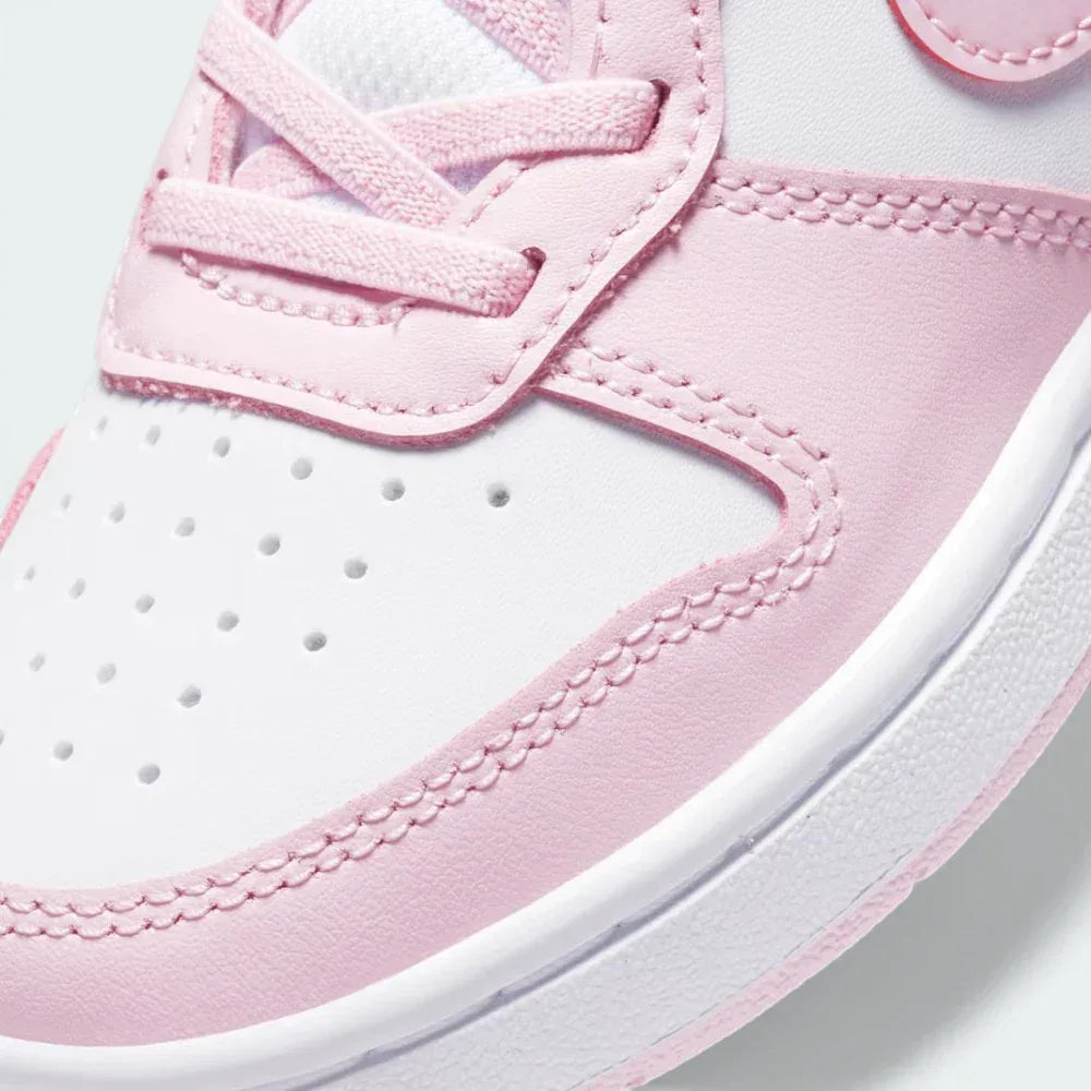 Close-up of the front, focusing on the elasticated laces and the textured finish of the premium leather toe.