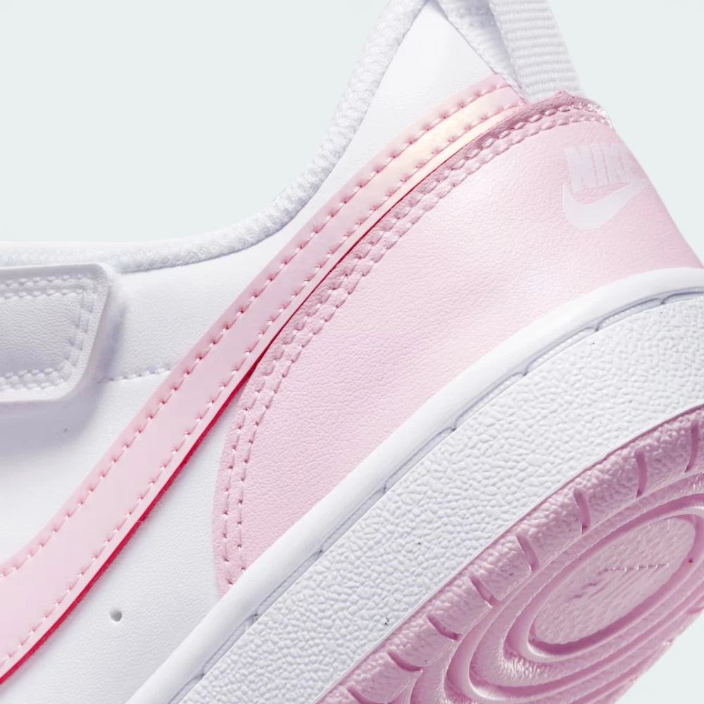 Detailed zoom on the midsole and the contrast pink stitching, highlighting the durable cupsole construction.