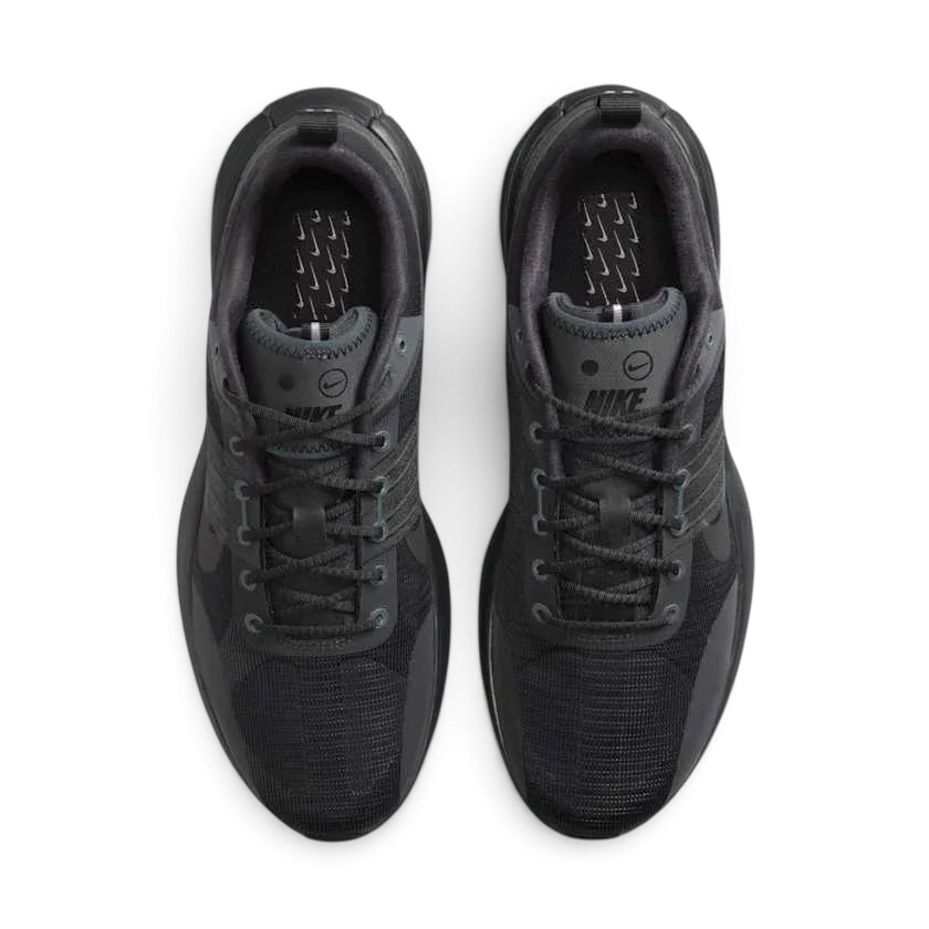 Top-down view of a pair of Nike Lunar Roam Men's trainers in dark smoke grey, highlighting the lace-up closure and integrated Magwire cables.