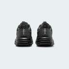 Rear view of the Nike Lunar Roam Men's trainers in dark smoke grey, focusing on the sculpted heel and subtle branding.
