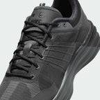 Close-up zoom on the front of the Nike Lunar Roam Men's trainers, showing the breathable textile upper texture, Magwire details, and lacing system.