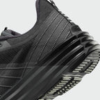 Detailed zoom on the outsole and midsole of the Nike Lunar Roam Men's trainers, highlighting the thick, responsive Lunar foam cushioning and durable rubber outsole.
