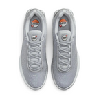 Top-down view of a pair of Nike Air Max DN Men's running shoes in grey, highlighting their futuristic design and lace-up closure.