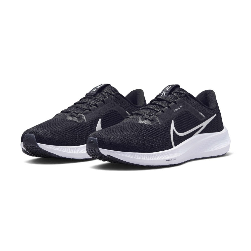 Emphasising the low-slung, athletic road-running stance and the crisp contrast between the all-black engineered mesh body and the bright white cushioning midsole.