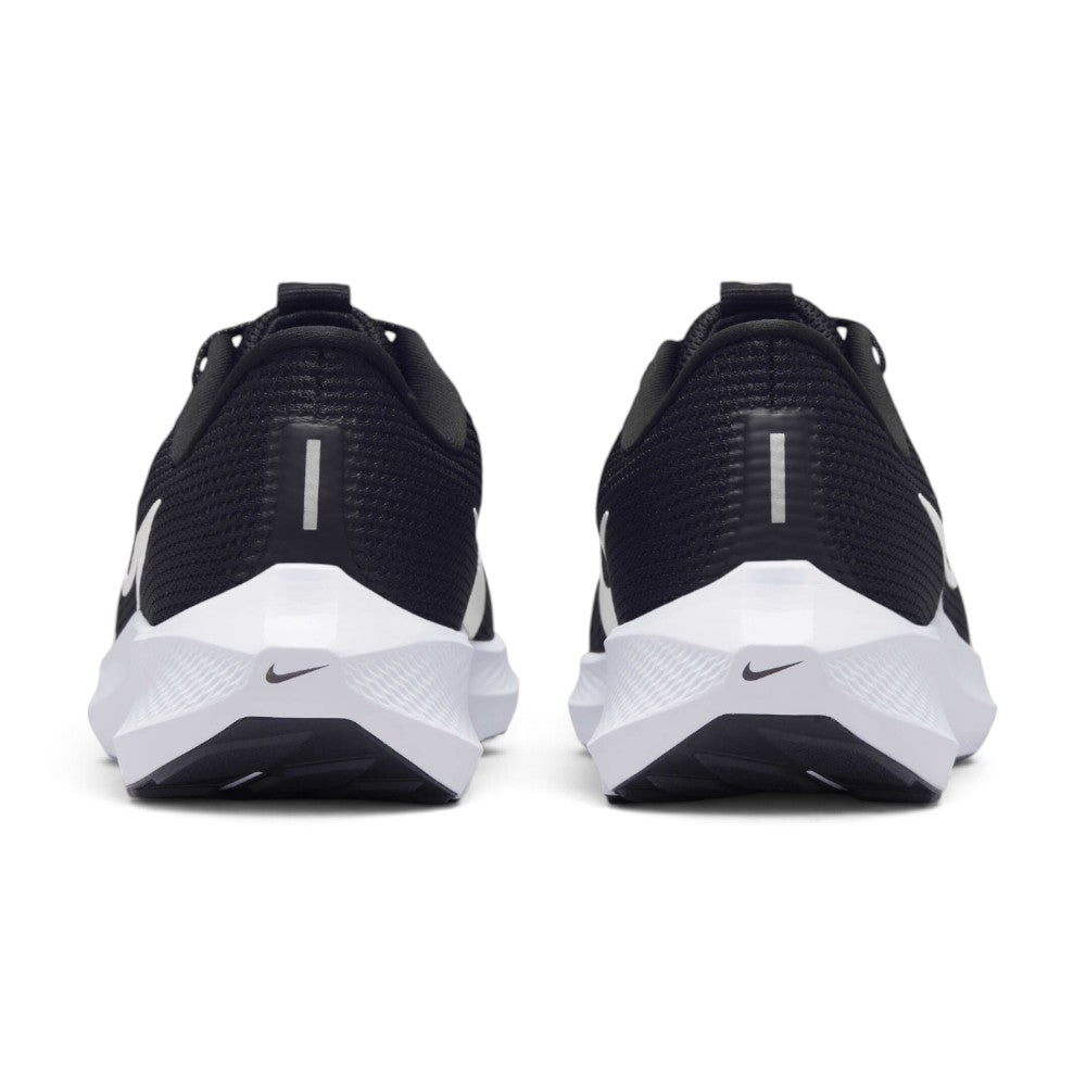 Focuses on the rear profile, displaying the seamless black engineered mesh heel counters, vertical reflective safety bars, micro-Swooshes on the midsole bevel, and the wide flared base of the React foam platform.