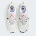 Focuses on the locked-in lacing layout, displaying the Pink Foam mesh tongues, patterned flecked laces, yellow, pink, and navy Flywire eyelet cables, and insoles printed with Mount Fuji sunrise graphics.