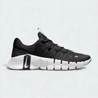 Nike Free Metcon 5 Men's training shoes in black and anthracite grey with white accents, side profile showing mesh upper, flexible forefoot, and stable heel.